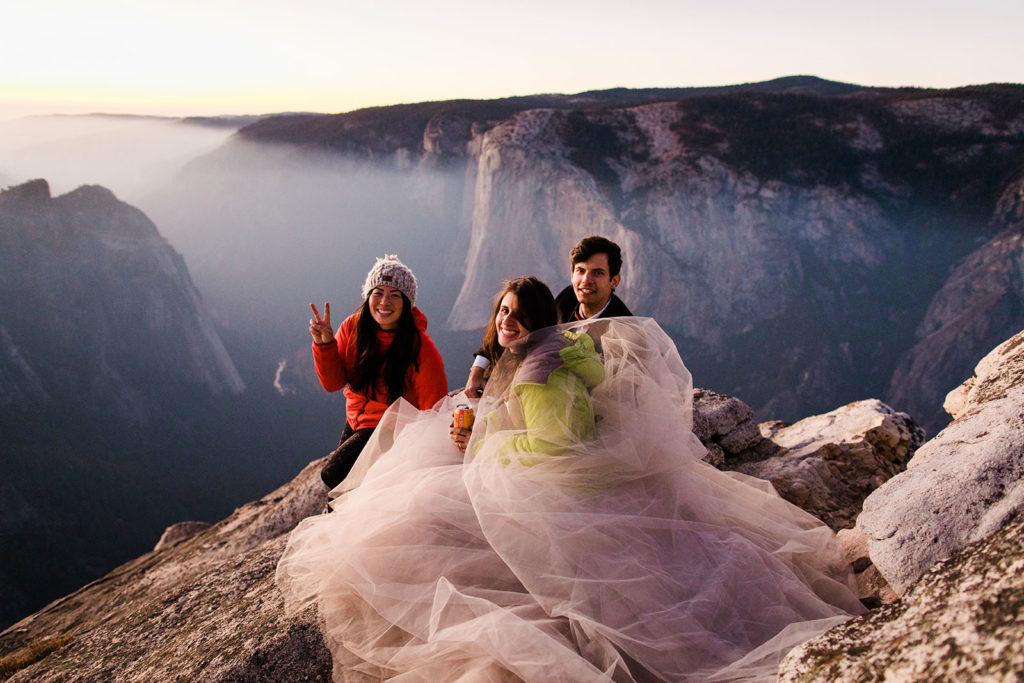 Stephanie Keegan and a newly eloped couple on a mountain in Yosemite