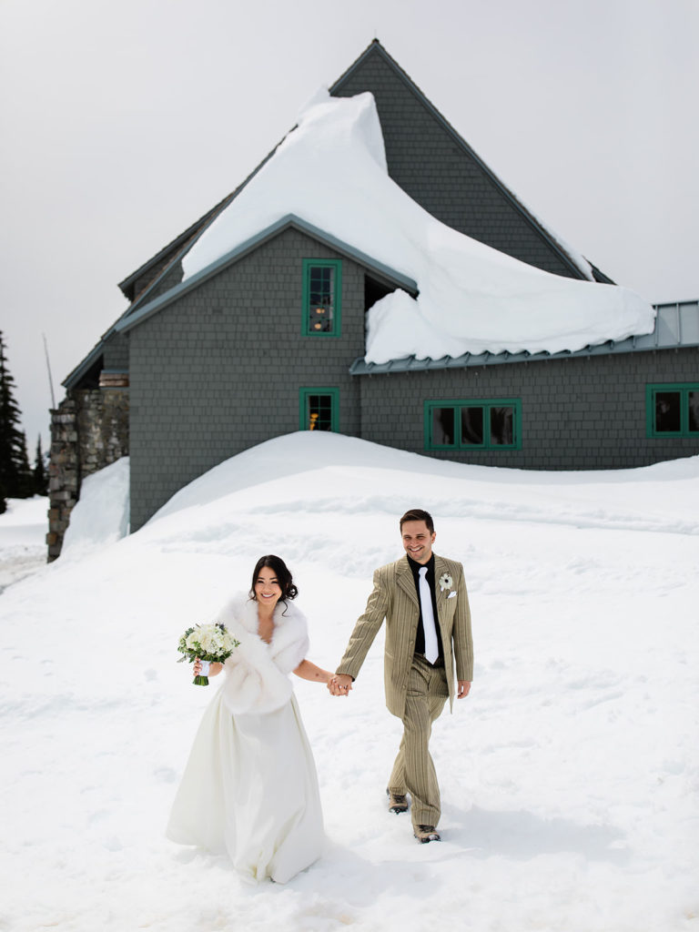Bride and Groom Walking in the Snow