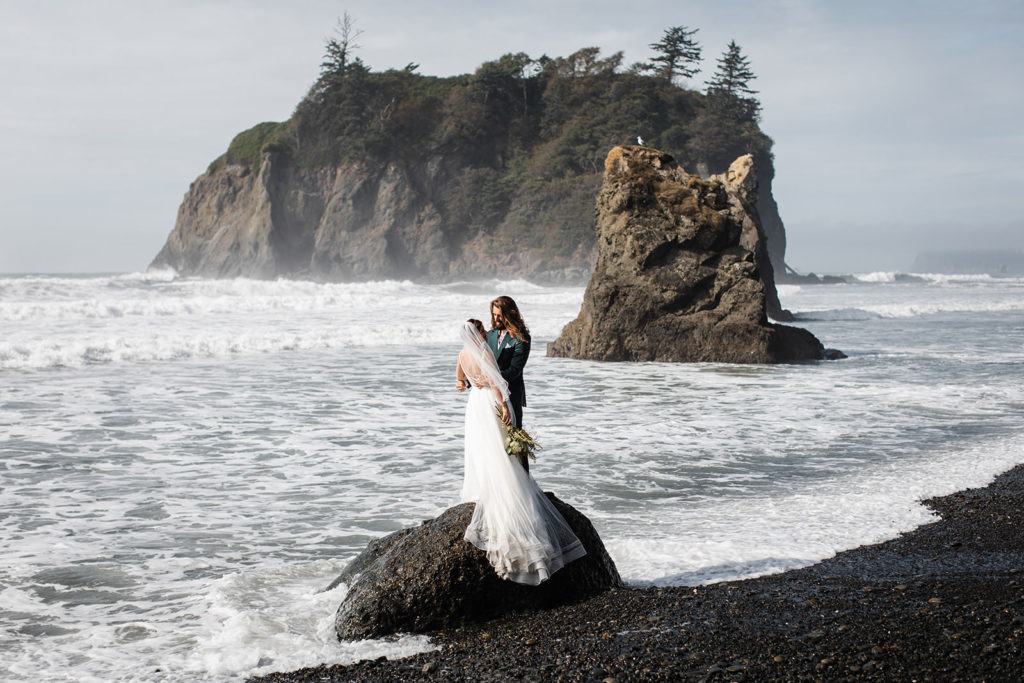 Couple getting eloped at Ruby Beach, Washington State