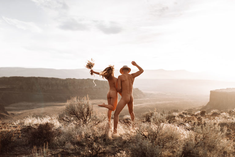 Newly eloped couple posing nude at Columbia River Gorge, Washington State