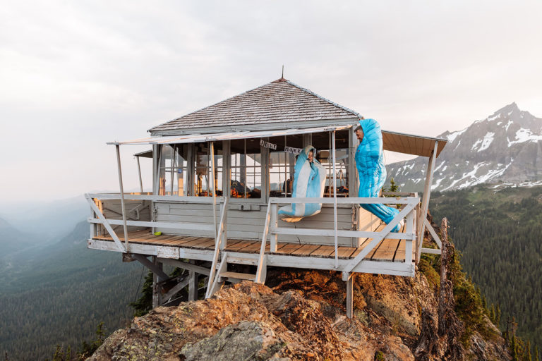 Newlyweds celebrating in a fire lookout tower in the North Cascades, Washington State